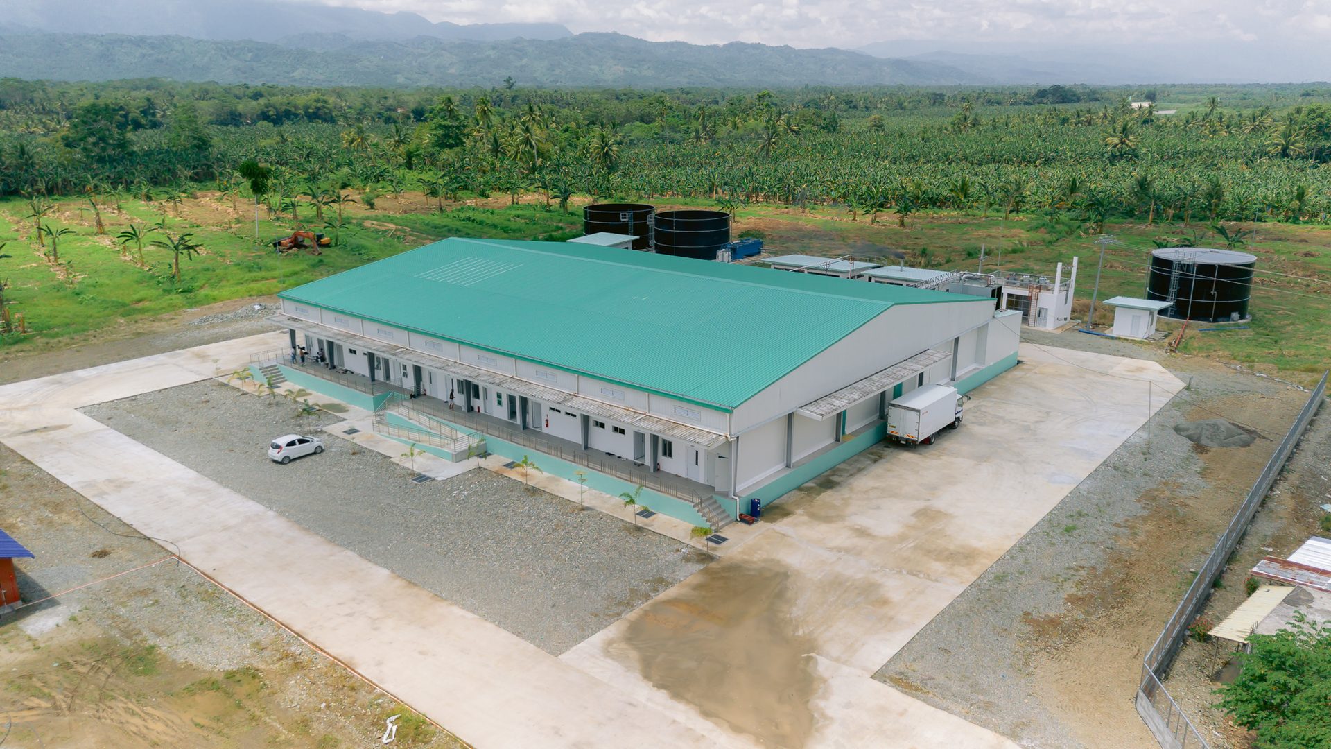 Aerial view of the 3,600 BPH Monkayo Poultry Dressing Plant with its clean water tank and wastewater treatment tanks, built by SolidWurth Corp. in Davao de Oro